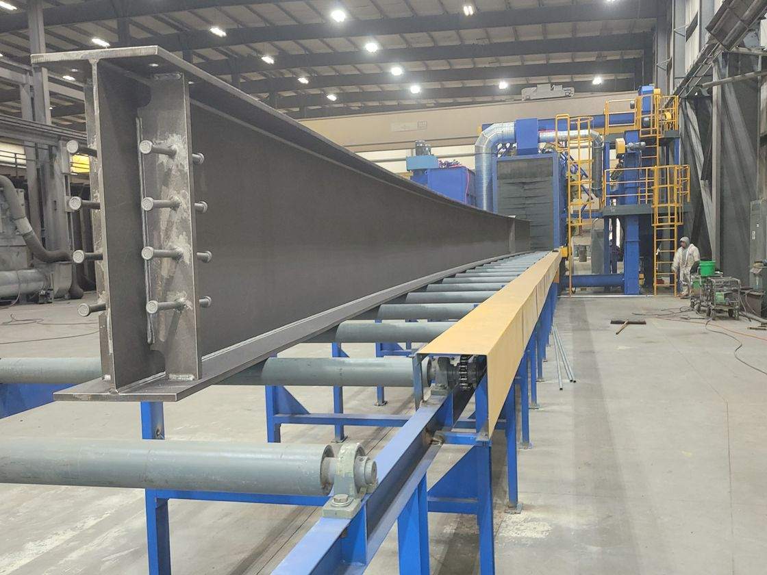 Abrasive blasting a structural steel girder in a Regal Industrial blast room